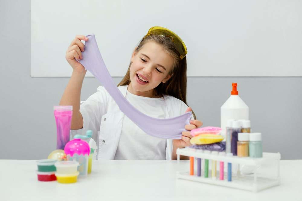 girl playing with slime